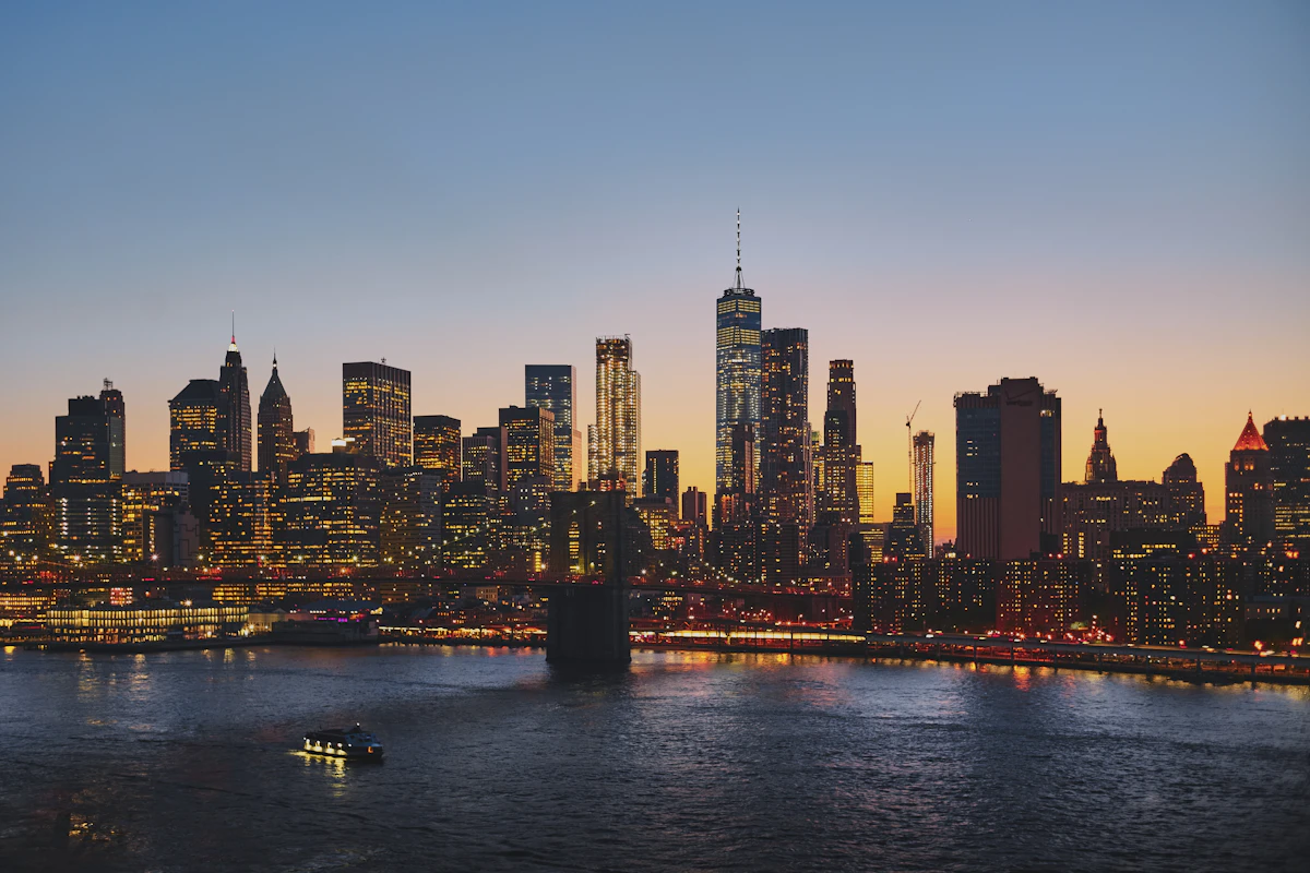 The Brooklyn Bridge and the Manhattan skyline at dusk