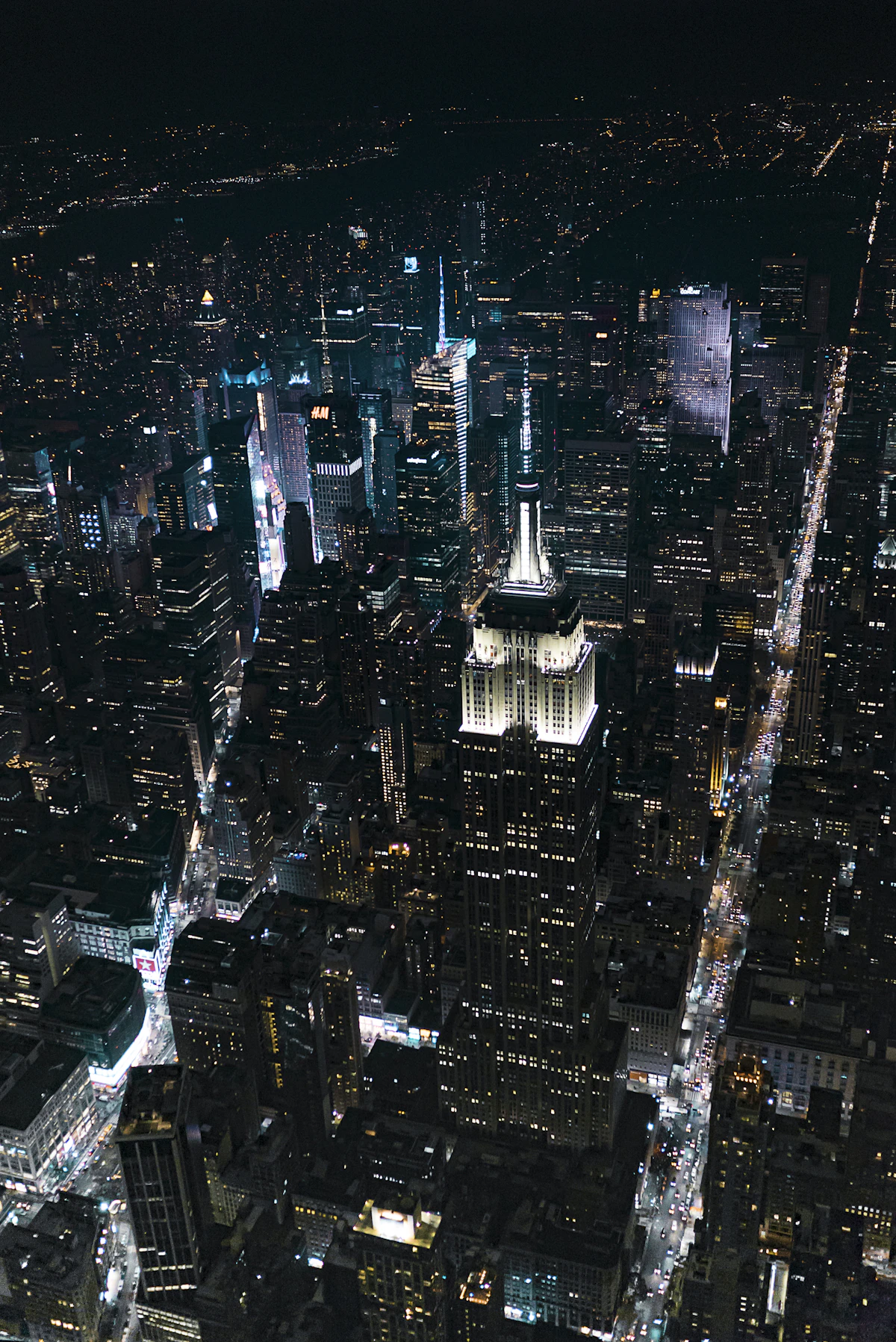 Aerial view of the illuminated Empire State Building in New York City at night